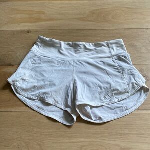white lululemon shorts